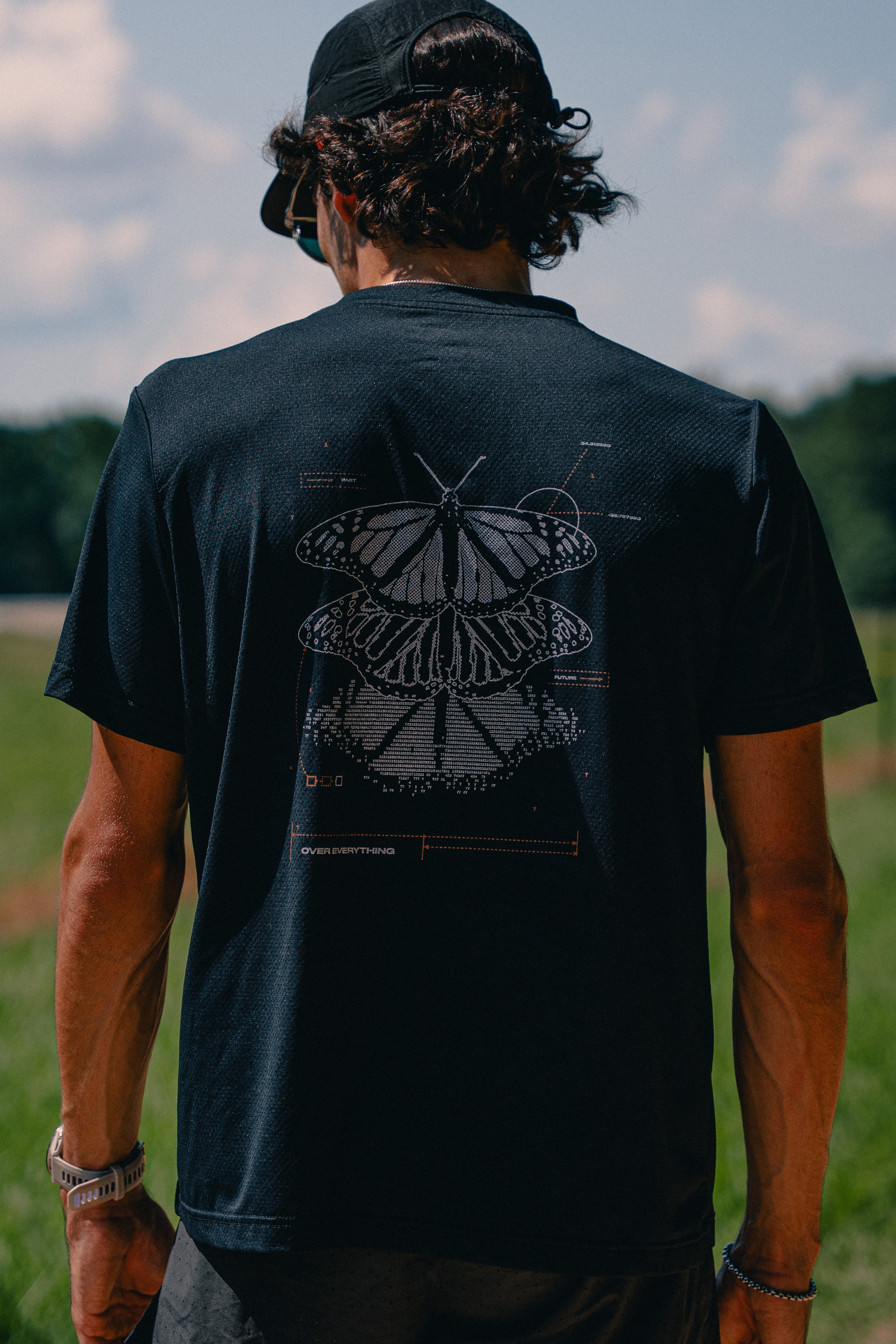 Metamorphosis Performance Tee