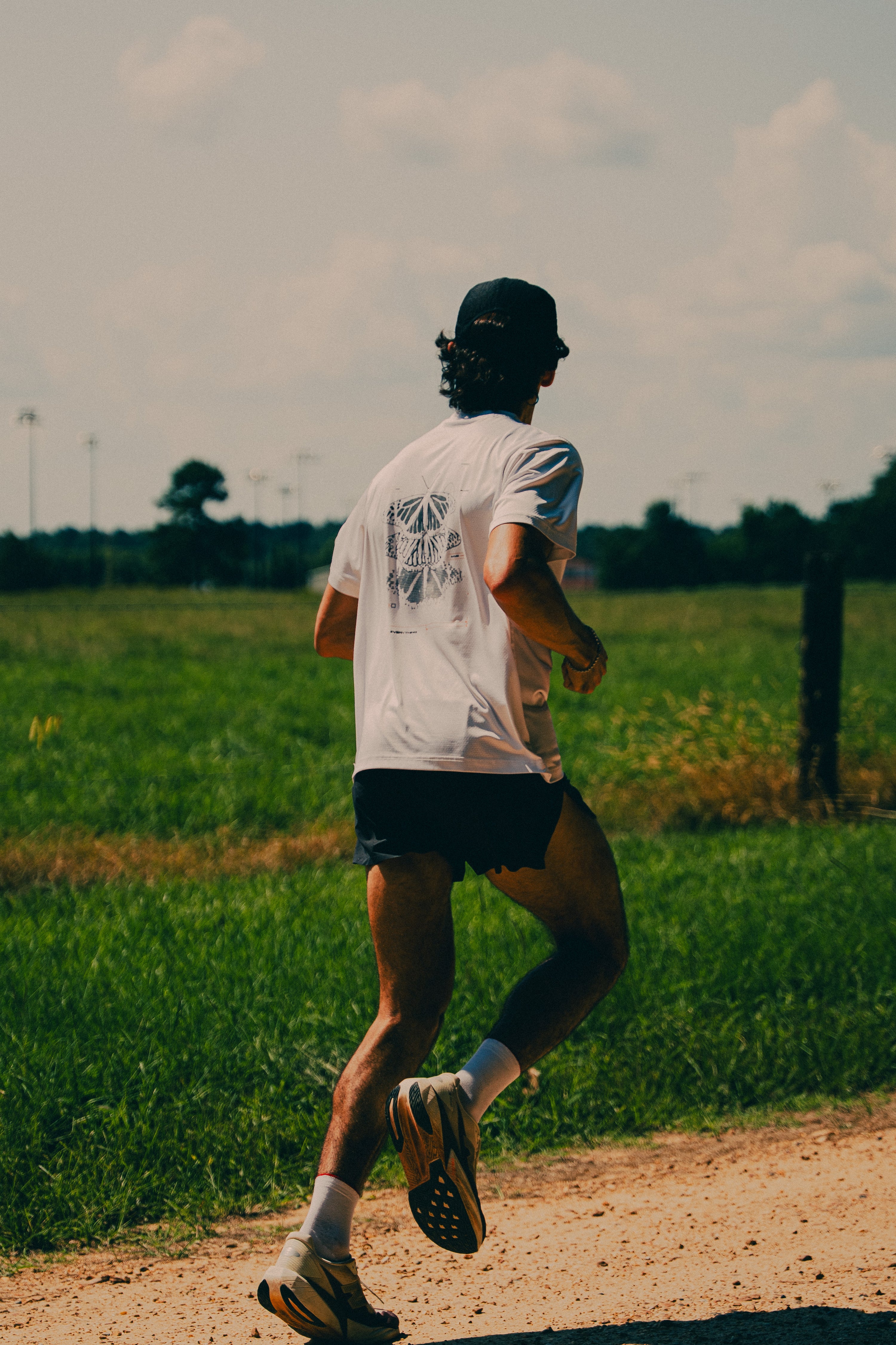 Metamorphosis Performance Tee