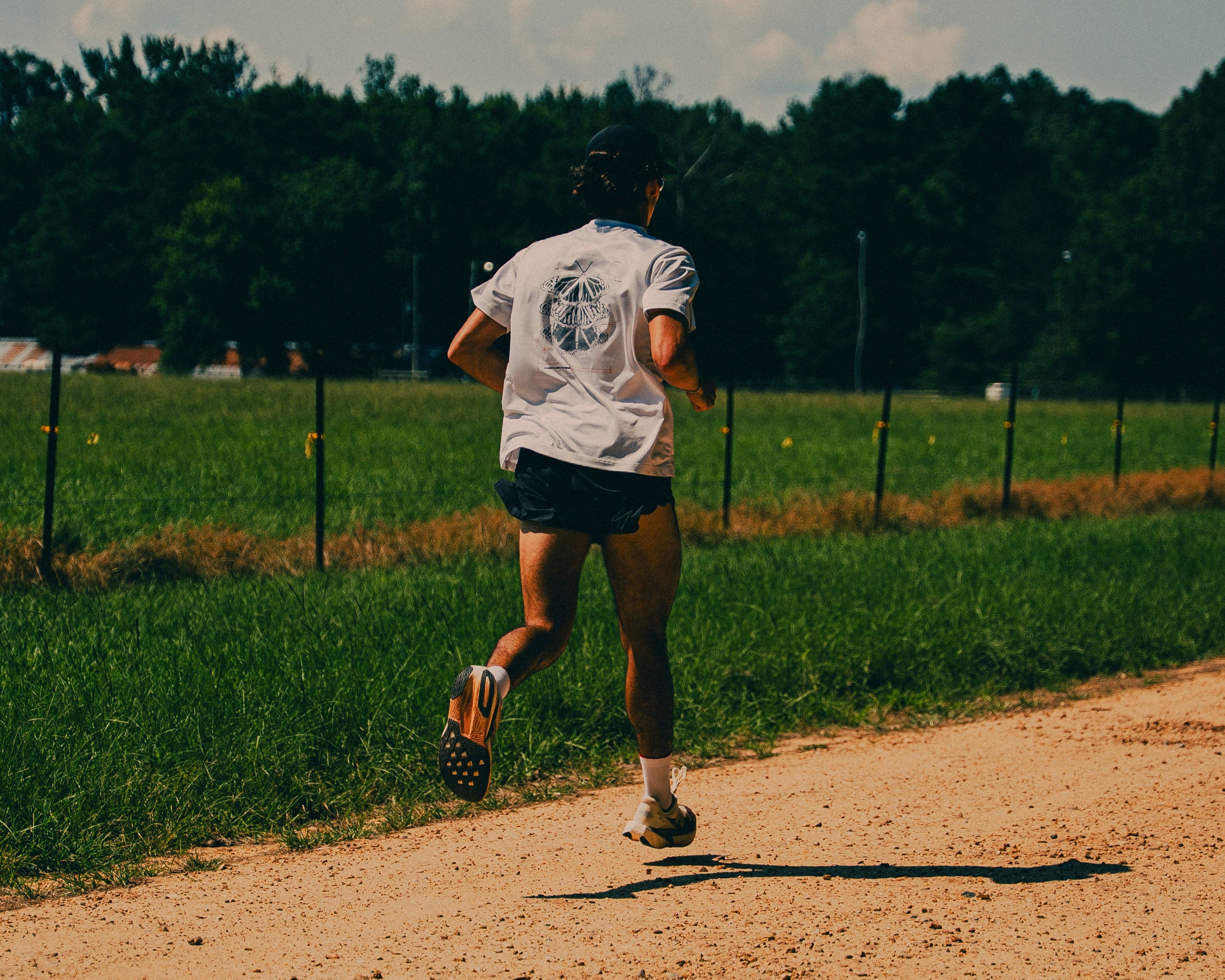 Metamorphosis Performance Tee