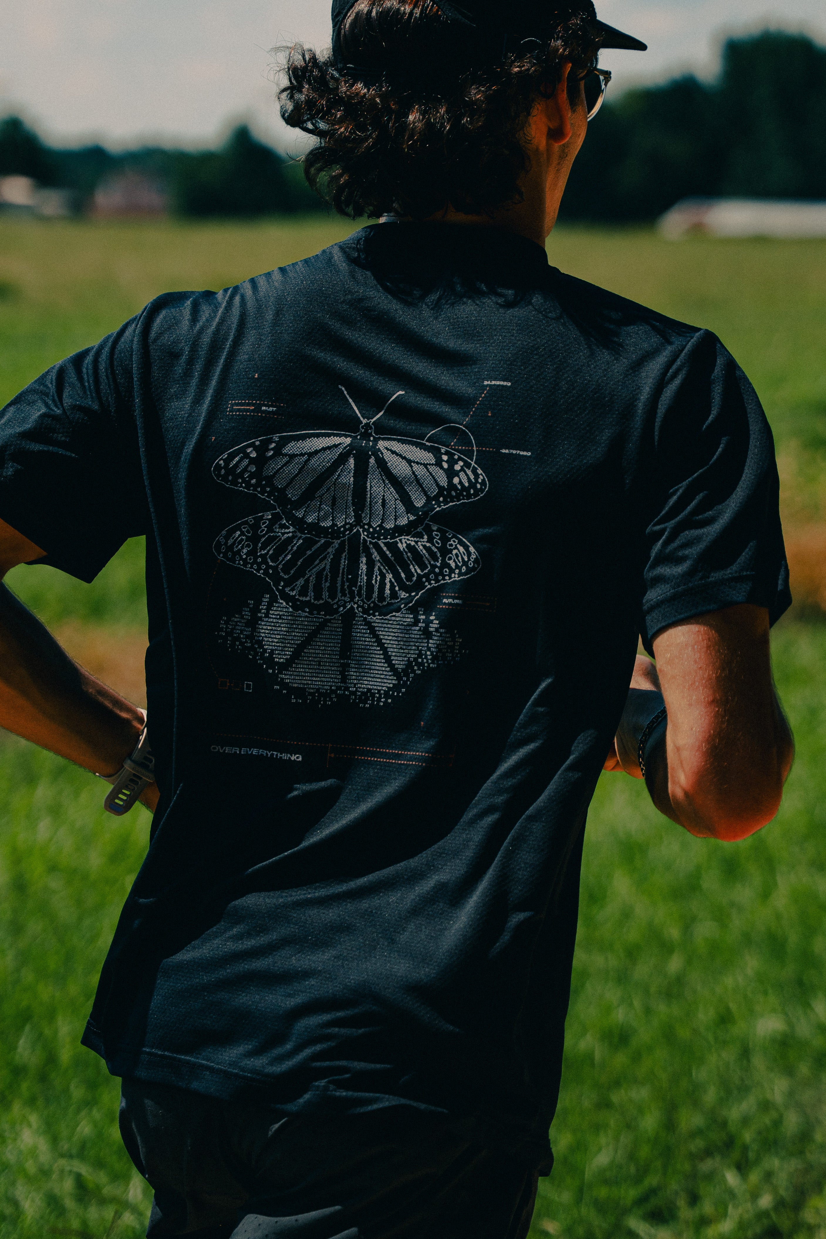 Metamorphosis Performance Tee